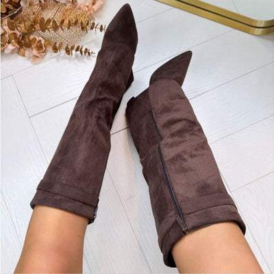 Women's boots with block heels and an elegant fit, featuring buckles in suede or leather