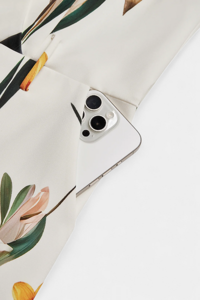 Slara Vacation Jumpsuit with Deep V-Neckline and Adjustable Belt